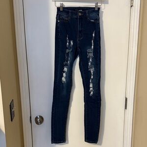 Distressed Blue Jeans